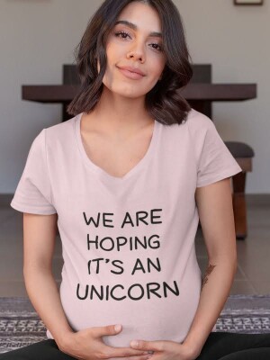 We are hoping it's an unicorn, nosečniška majica